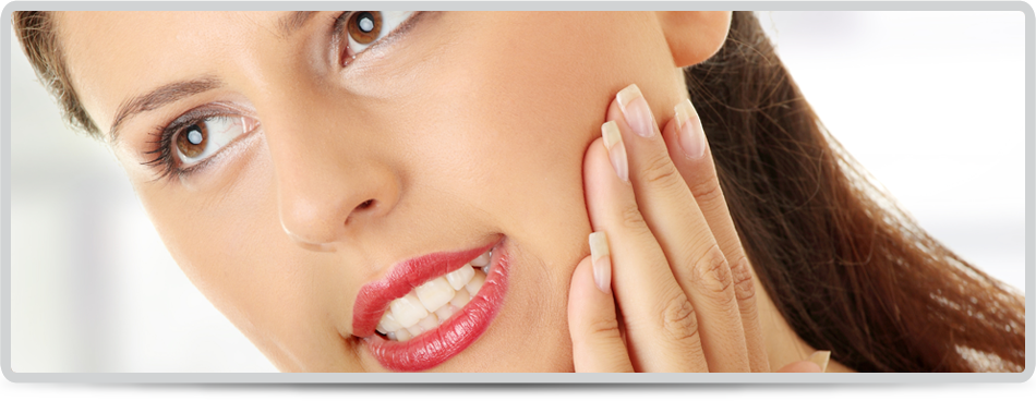 Young woman in pain is having toothache