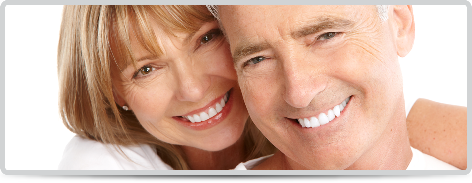 Happy seniors couple in love. Healthy teeth. Isolated over white background