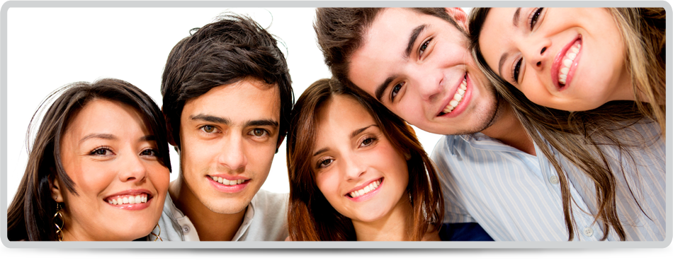 Happy group of young people smiling - isolated over white 